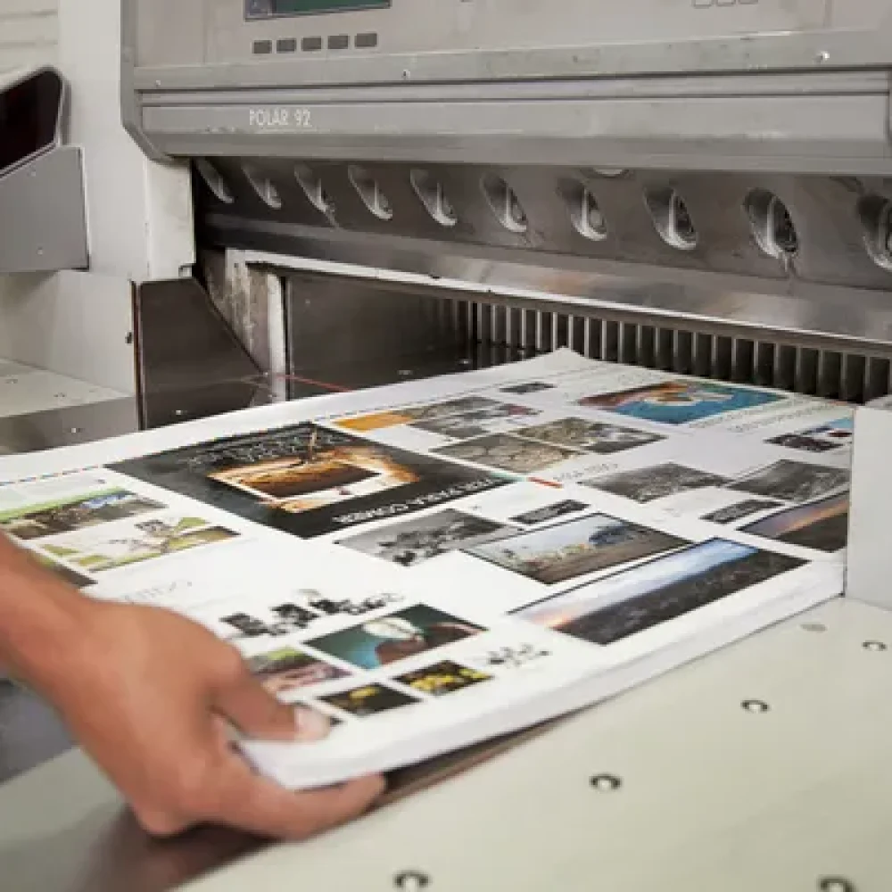 depositphotos_46353969-stock-photo-sheet-pulled-from-printing-press